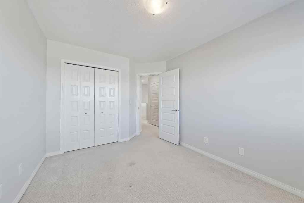 MLS® A2264670 - Unit #401 1086 Williamstown Boulevard NW in Williamstown Airdrie, Residential