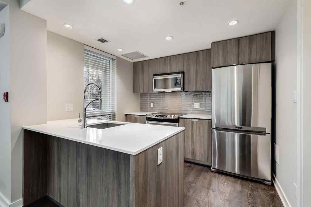 MLS® A2264680 - 638 14 Avenue SW in Beltline Calgary, Residential