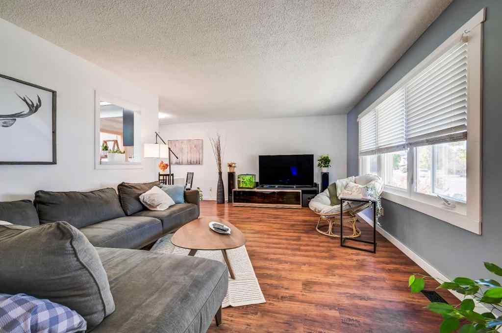 MLS® A2264693 - 828 Queensland Drive SE in Queensland Calgary, Residential