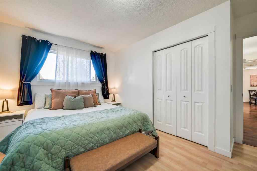 MLS® A2264693 - 828 Queensland Drive SE in Queensland Calgary, Residential