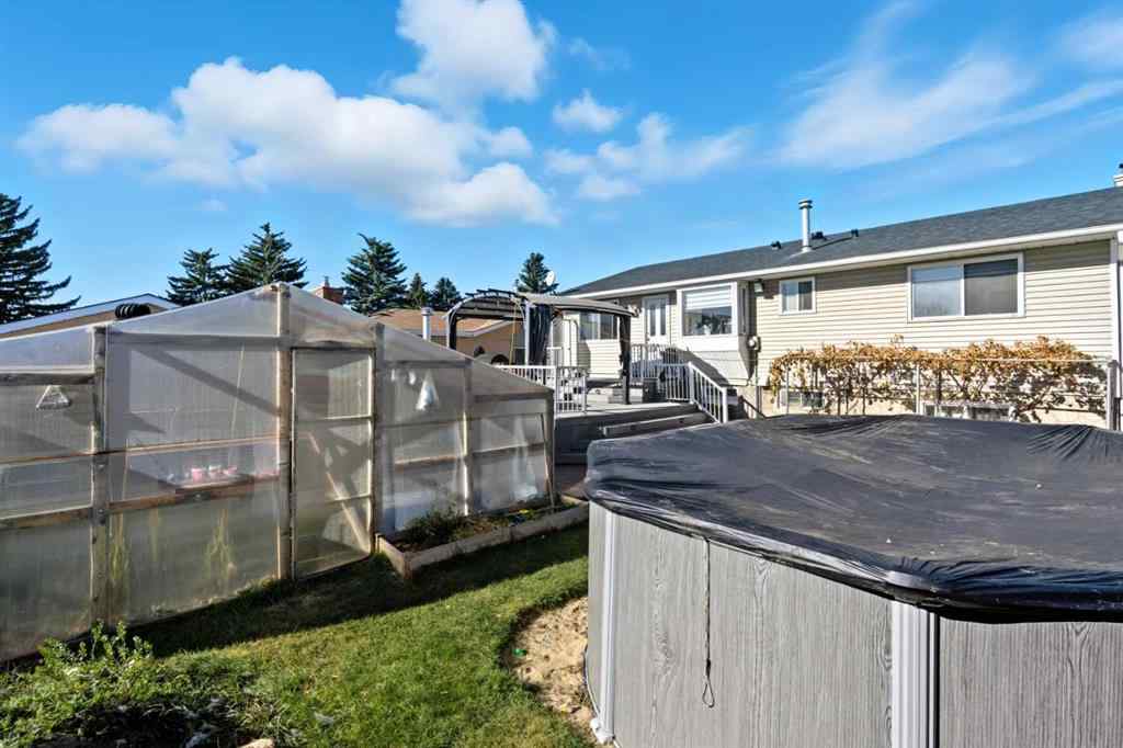 MLS® A2264712 - 211 Pinetree Place NE in Pineridge Calgary, Residential