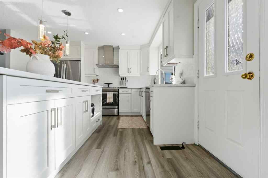 MLS® A2264712 - 211 Pinetree Place NE in Pineridge Calgary, Residential