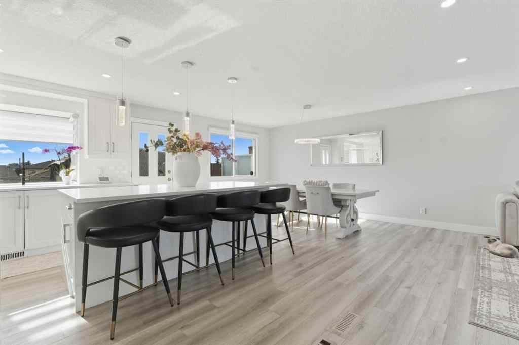 MLS® A2264712 - 211 Pinetree Place NE in Pineridge Calgary, Residential