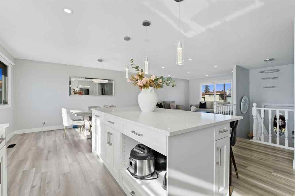 MLS® A2264712 - 211 Pinetree Place NE in Pineridge Calgary, Residential