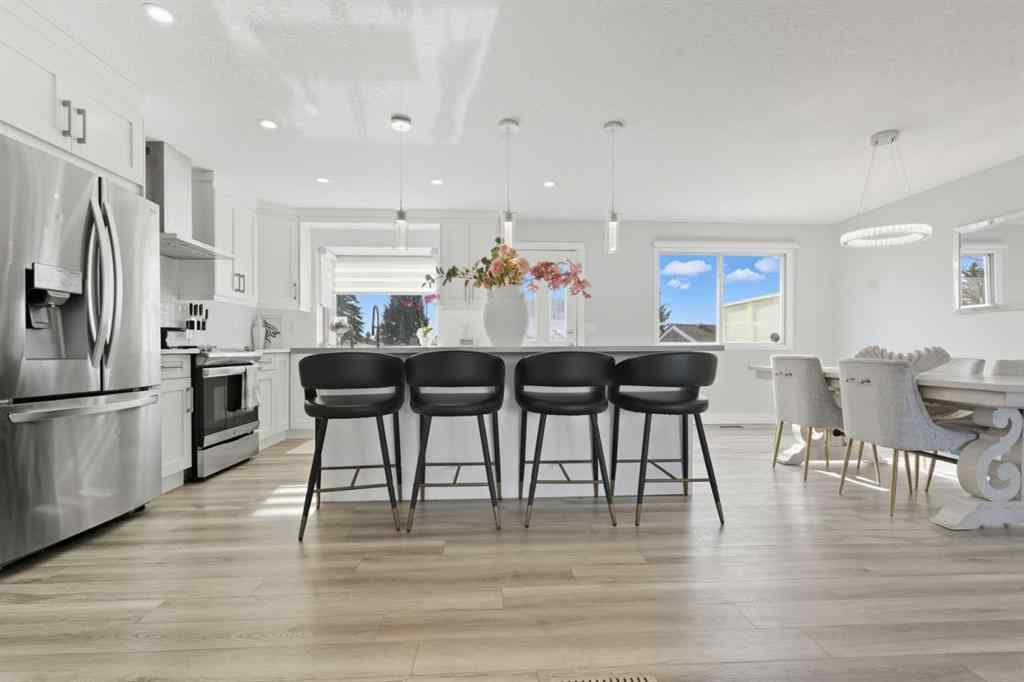 MLS® A2264712 - 211 Pinetree Place NE in Pineridge Calgary, Residential