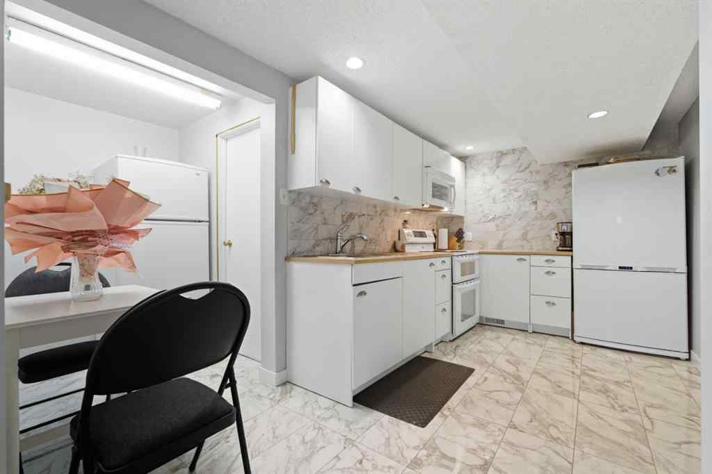 MLS® A2264712 - 211 Pinetree Place NE in Pineridge Calgary, Residential