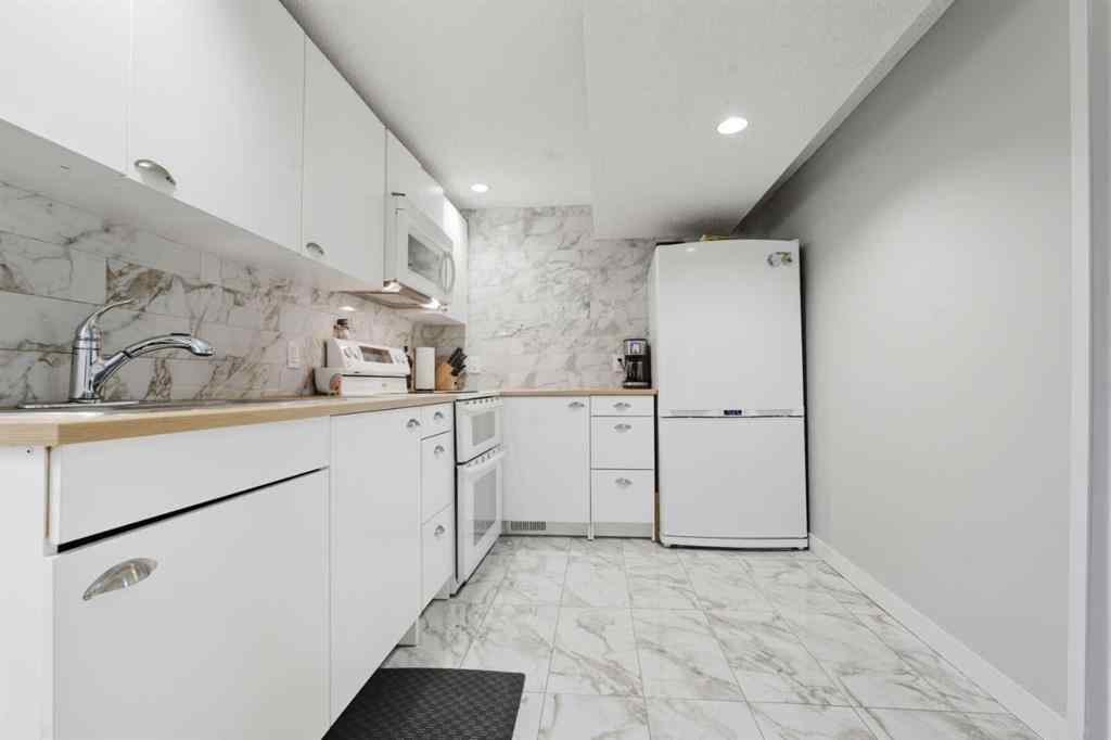 MLS® A2264712 - 211 Pinetree Place NE in Pineridge Calgary, Residential