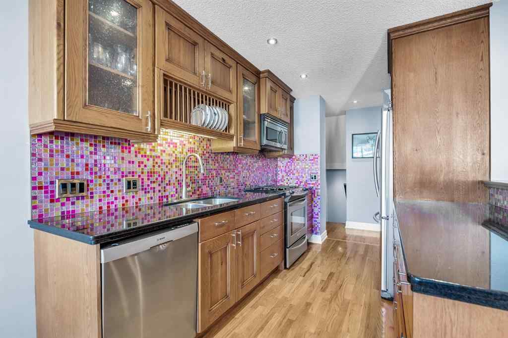 MLS® A2264722 - 202 30 Avenue NW in Tuxedo Park Calgary, Residential