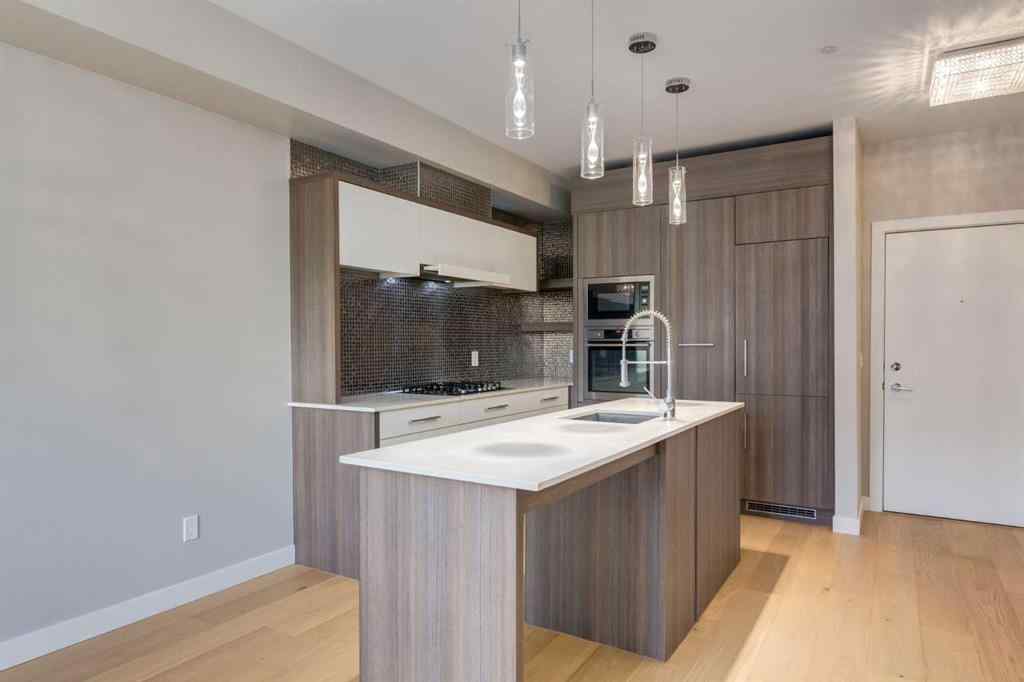 MLS® A2264728 - Unit #205 119 19 Street NW in West Hillhurst Calgary, Residential