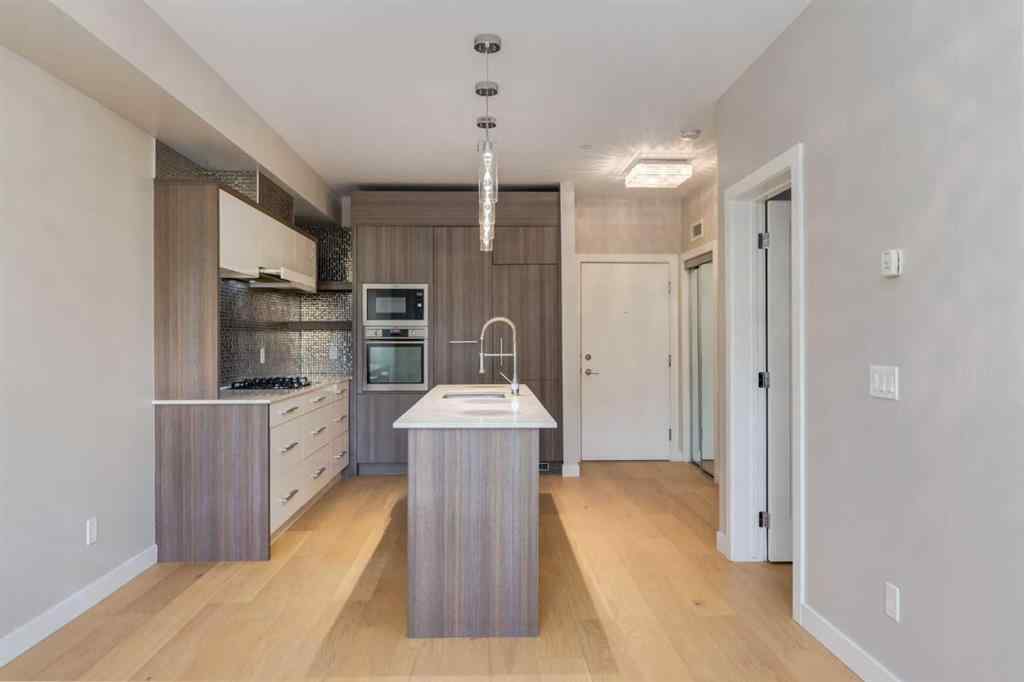 MLS® A2264728 - Unit #205 119 19 Street NW in West Hillhurst Calgary, Residential