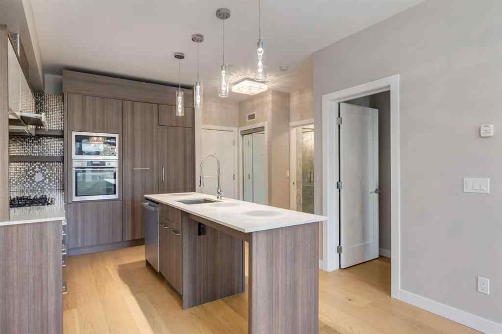 MLS® A2264728 - Unit #205 119 19 Street NW in West Hillhurst Calgary, Residential