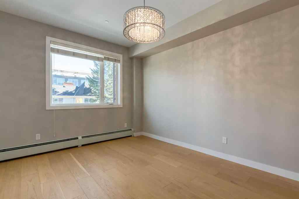 MLS® A2264728 - Unit #205 119 19 Street NW in West Hillhurst Calgary, Residential