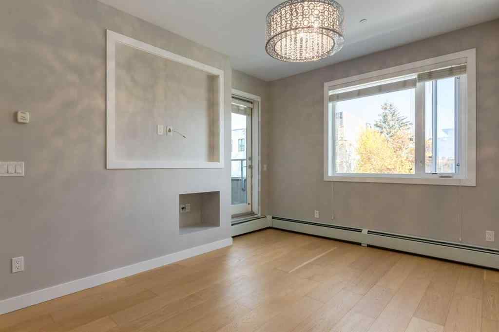 MLS® A2264728 - Unit #205 119 19 Street NW in West Hillhurst Calgary, Residential