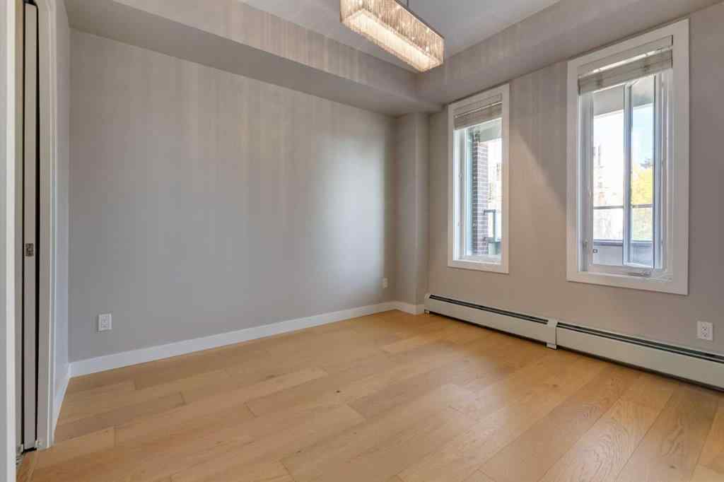 MLS® A2264728 - Unit #205 119 19 Street NW in West Hillhurst Calgary, Residential