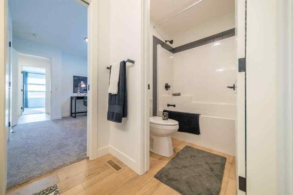 MLS® A2264733 - 76 Creekside Path SW in Pine Creek Calgary, Residential