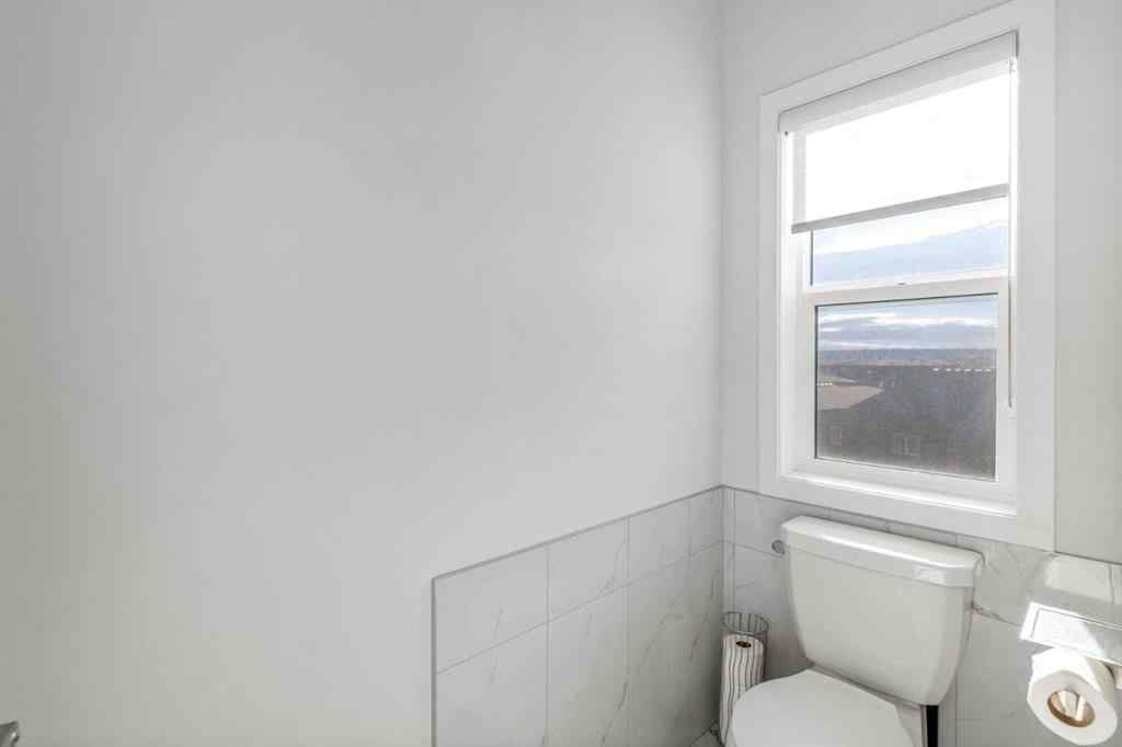 MLS® A2264746 - 27 Lucas Terrace NW in Livingston Calgary, Residential