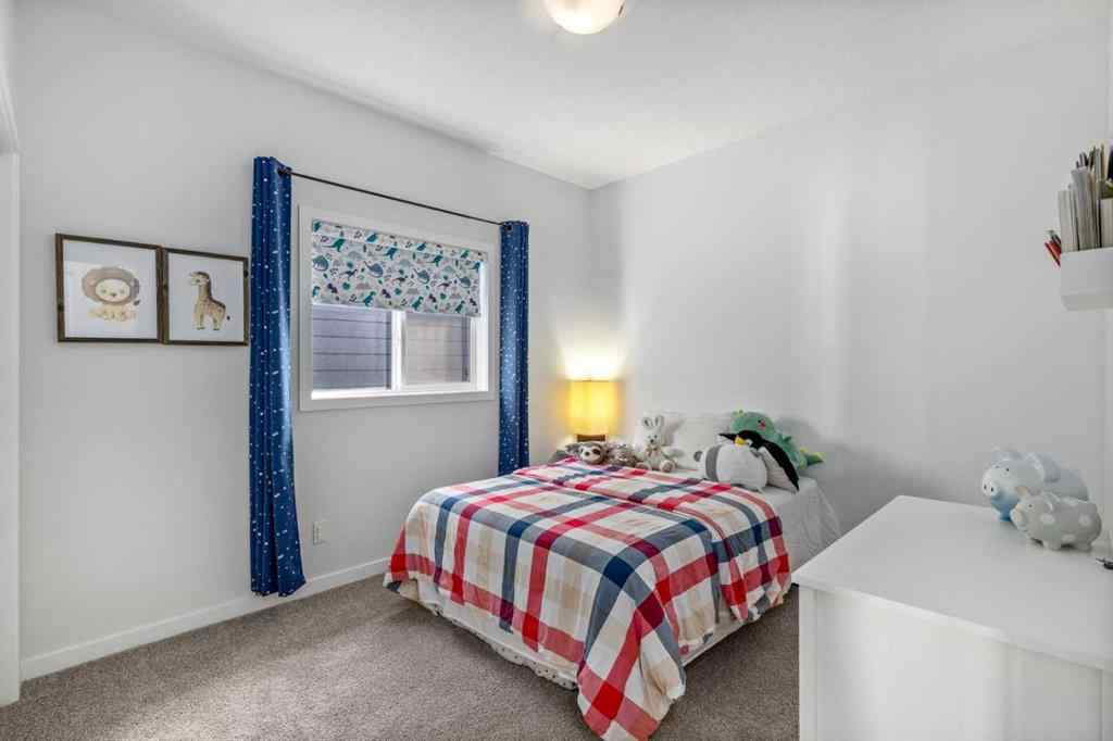 MLS® A2264746 - 27 Lucas Terrace NW in Livingston Calgary, Residential