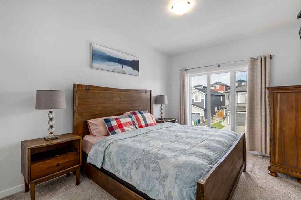 MLS® A2264746 - 27 Lucas Terrace NW in Livingston Calgary, Residential