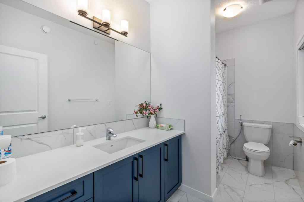 MLS® A2264746 - 27 Lucas Terrace NW in Livingston Calgary, Residential