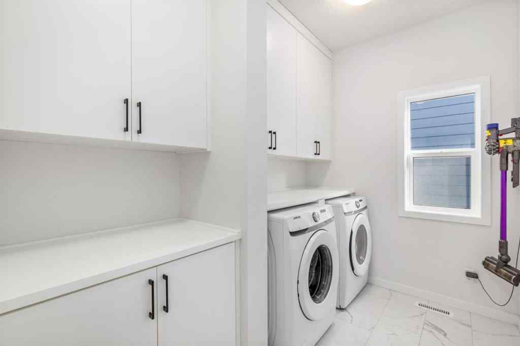 MLS® A2264746 - 27 Lucas Terrace NW in Livingston Calgary, Residential