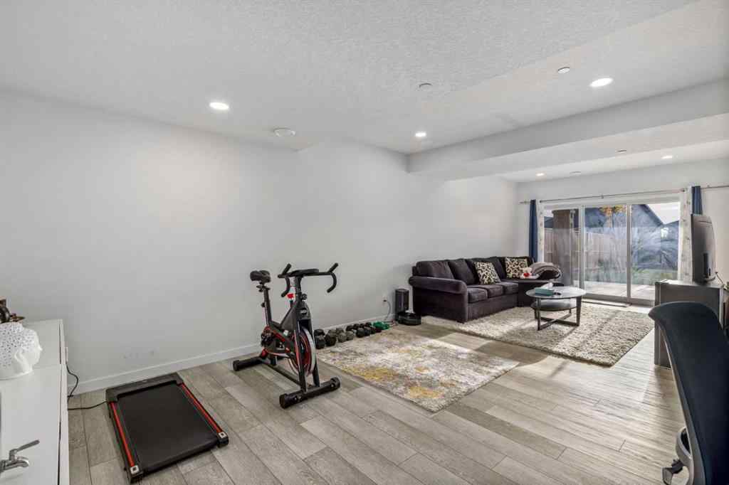 MLS® A2264746 - 27 Lucas Terrace NW in Livingston Calgary, Residential