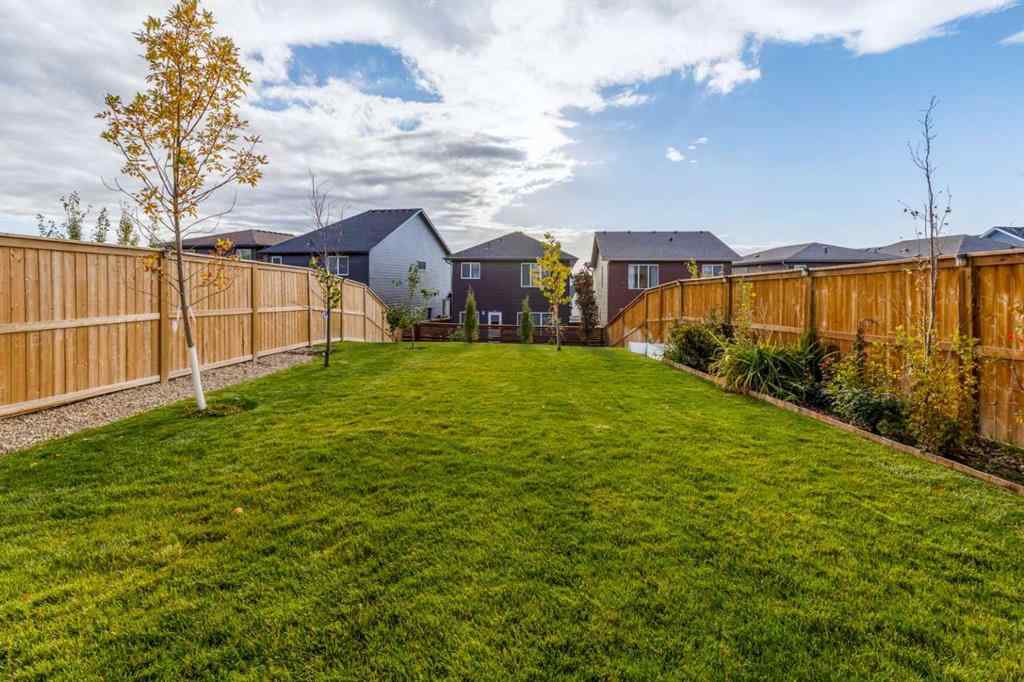 MLS® A2264746 - 27 Lucas Terrace NW in Livingston Calgary, Residential