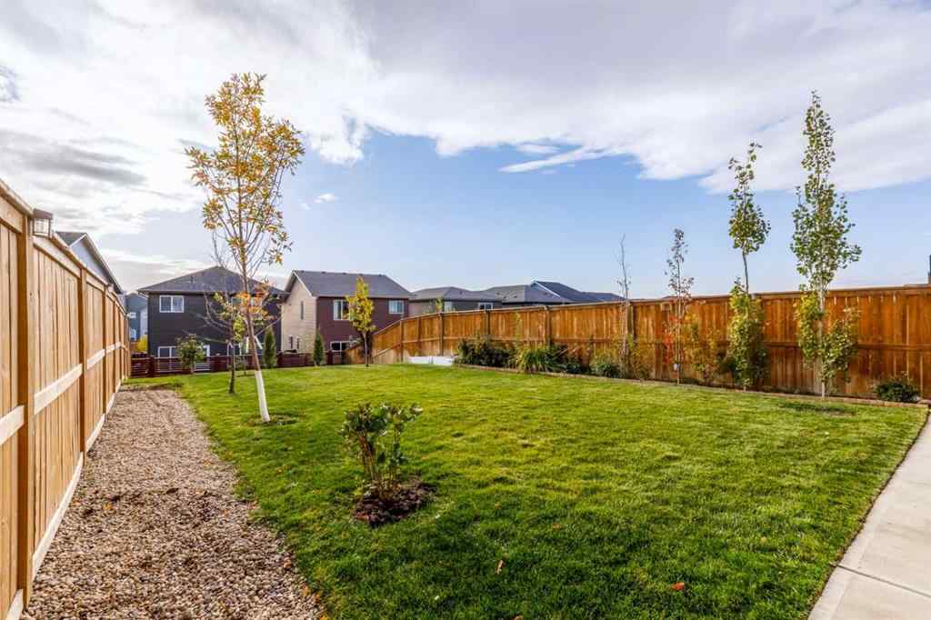 MLS® A2264746 - 27 Lucas Terrace NW in Livingston Calgary, Residential