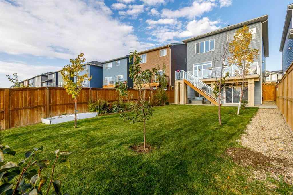 MLS® A2264746 - 27 Lucas Terrace NW in Livingston Calgary, Residential