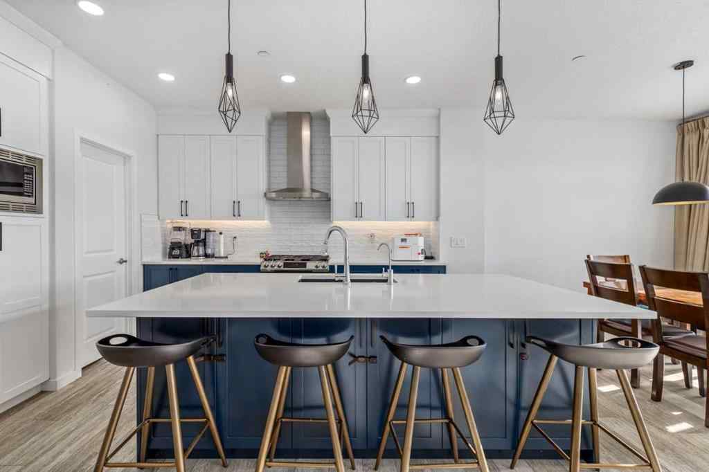 MLS® A2264746 - 27 Lucas Terrace NW in Livingston Calgary, Residential