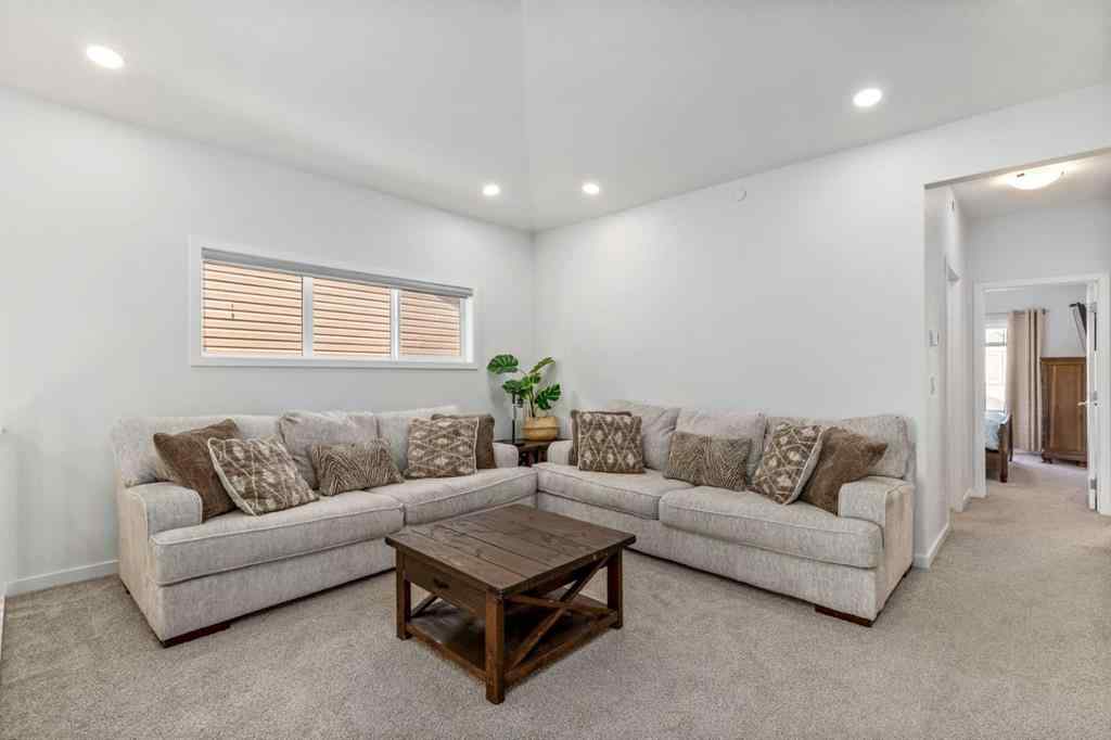 MLS® A2264746 - 27 Lucas Terrace NW in Livingston Calgary, Residential