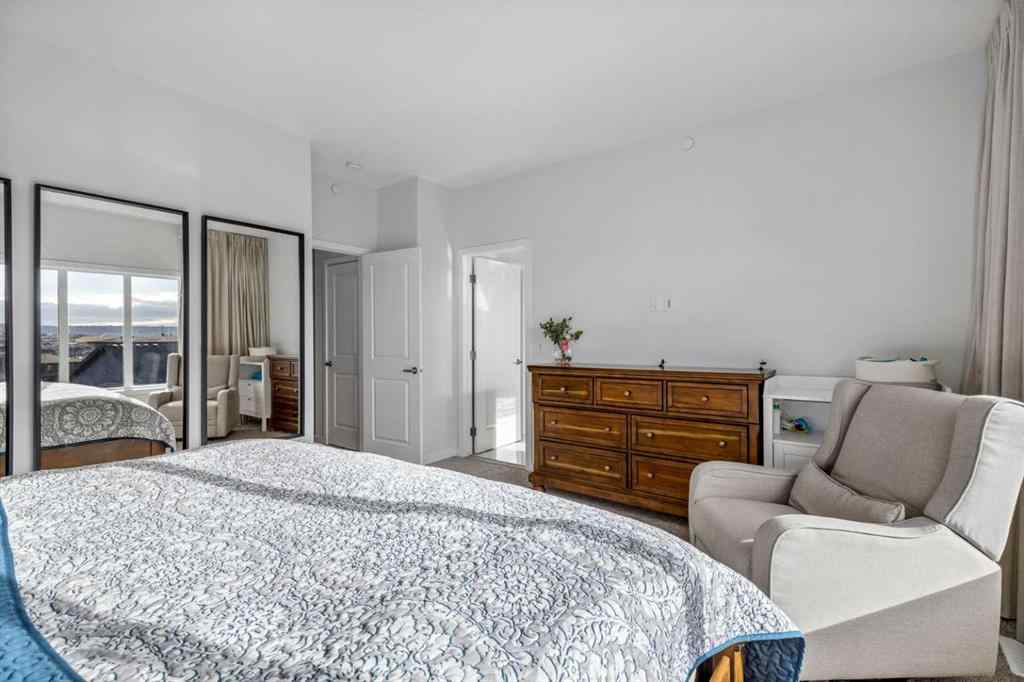 MLS® A2264746 - 27 Lucas Terrace NW in Livingston Calgary, Residential