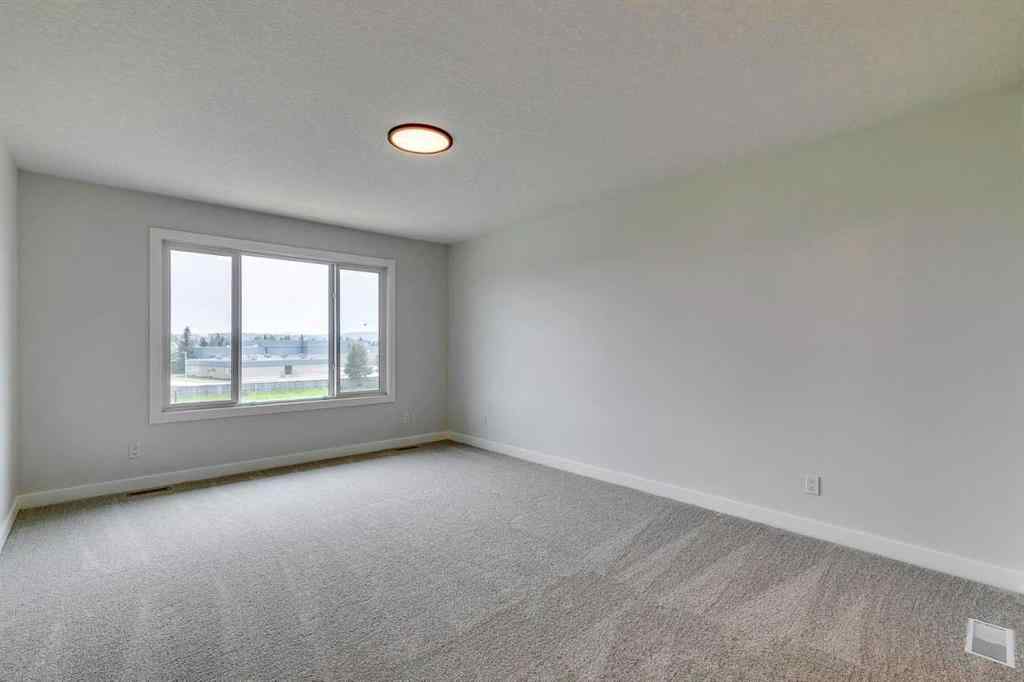 MLS® A2264758 - 99 Saddlebred Place  in Heartland Cochrane, Residential