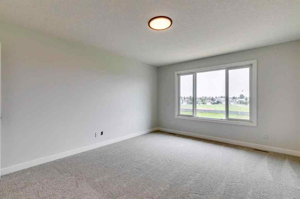 MLS® A2264758 - 99 Saddlebred Place  in Heartland Cochrane, Residential