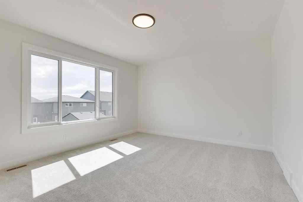 MLS® A2264762 - 612 Buffaloberry Manor SE in Ricardo Ranch Calgary, Residential