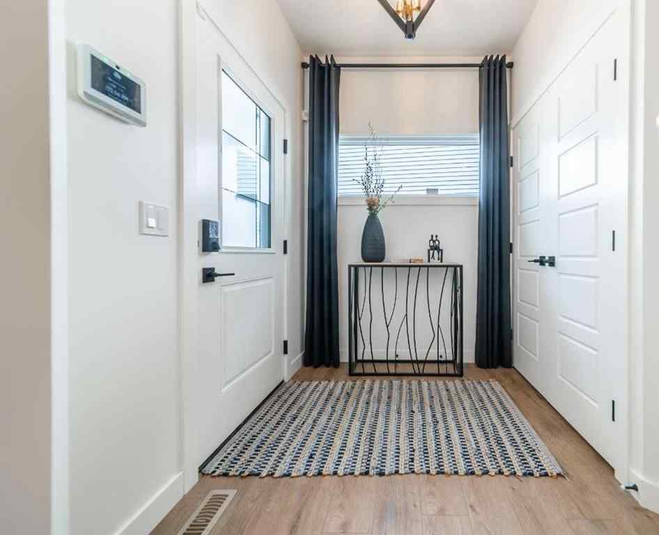 MLS® A2264763 - 704 Langley Terrace SE in Lanark Airdrie, Residential