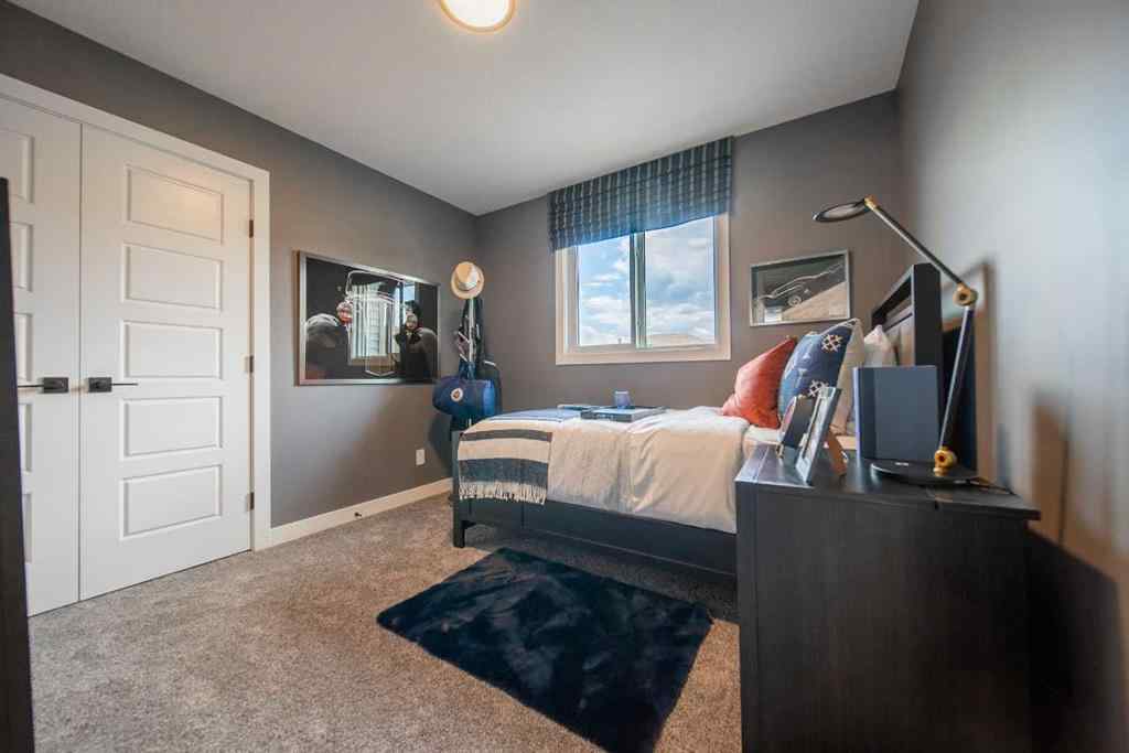 MLS® A2264763 - 704 Langley Terrace SE in Lanark Airdrie, Residential