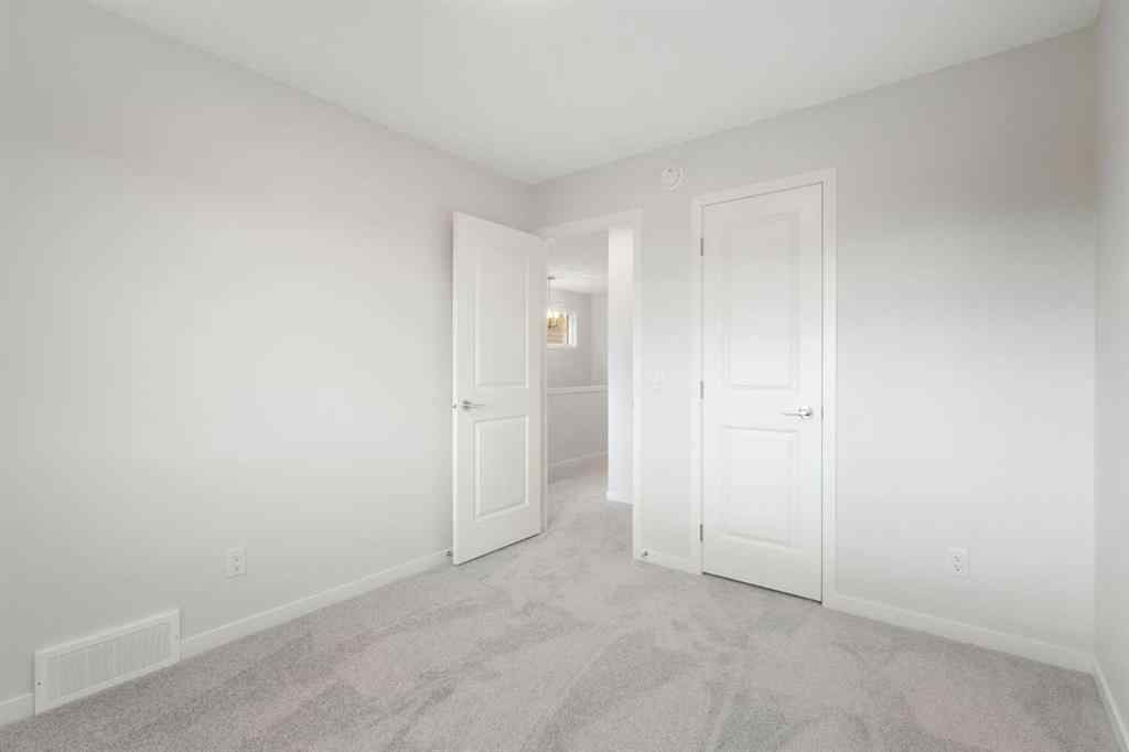 MLS® A2264770 - 680 Buffaloberry Manor SE in Ricardo Ranch Calgary, Residential