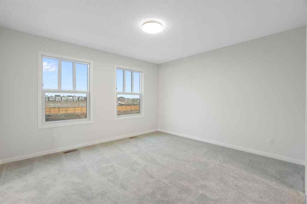 MLS® A2264770 - 680 Buffaloberry Manor SE in Ricardo Ranch Calgary, Residential