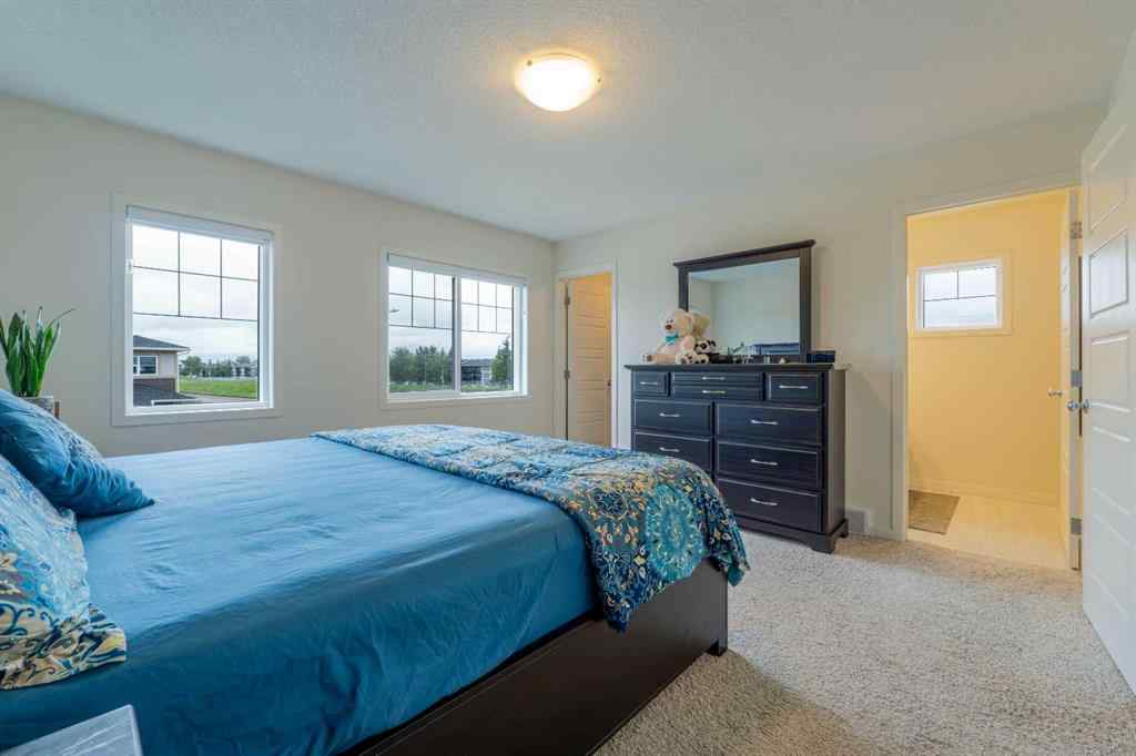 MLS® A2264790 - 117 Midtown Close SW in Midtown Airdrie, Residential