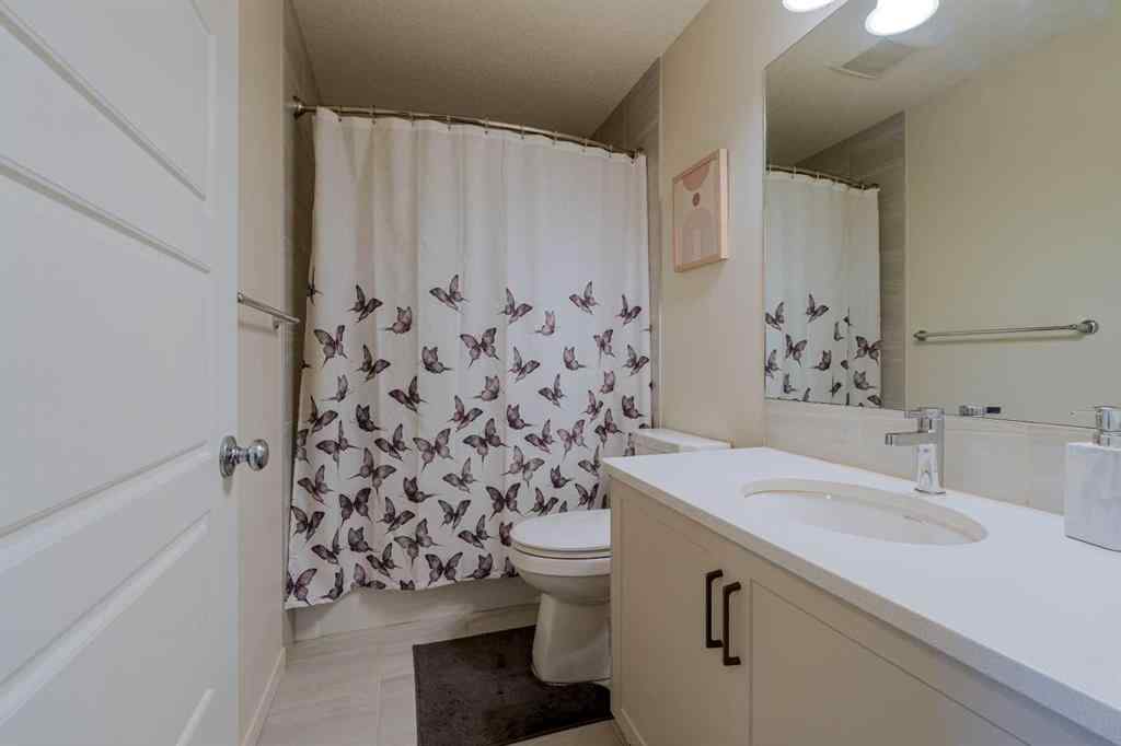 MLS® A2264790 - 117 Midtown Close SW in Midtown Airdrie, Residential