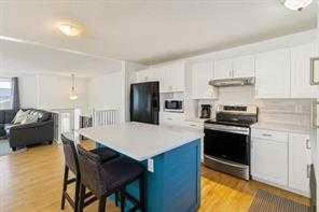 MLS® A2264793 - 14 Glenhill Crescent  in Glenbow Cochrane, Residential