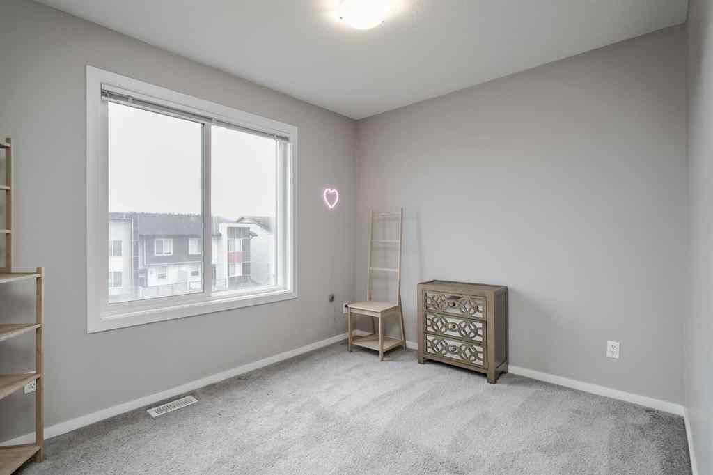 MLS® A2264808 - Unit #203 130 Redstone Walk NE in Redstone Calgary, Residential