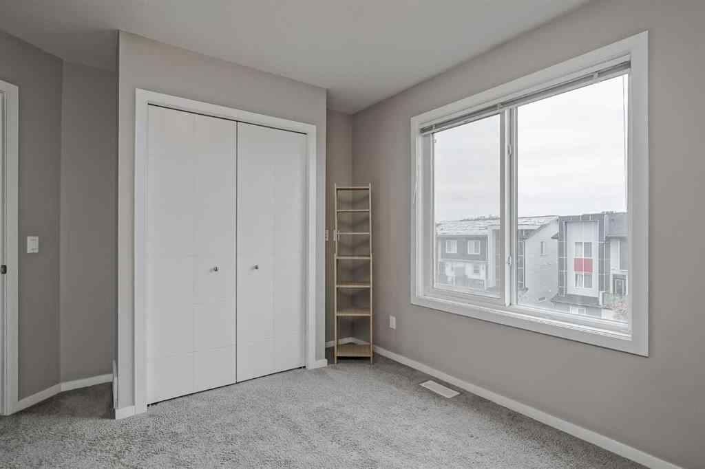 MLS® A2264808 - Unit #203 130 Redstone Walk NE in Redstone Calgary, Residential