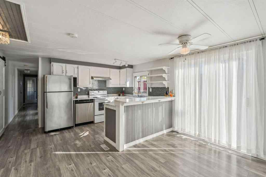 MLS® A2264810 - 12 Spring Haven Road SE in Big Springs Airdrie, Residential