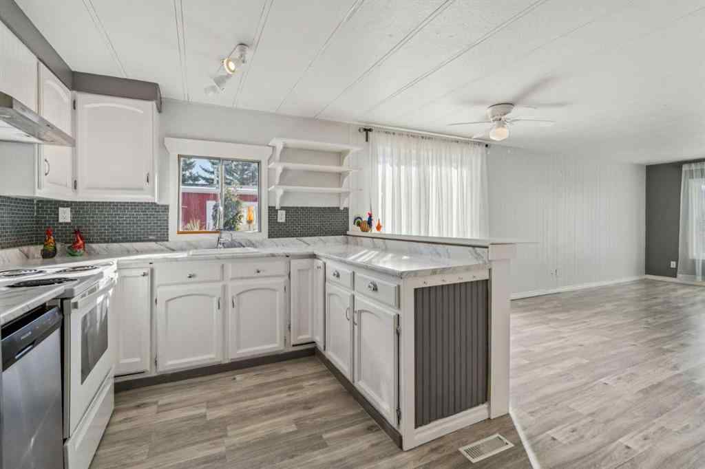 MLS® A2264810 - 12 Spring Haven Road SE in Big Springs Airdrie, Residential