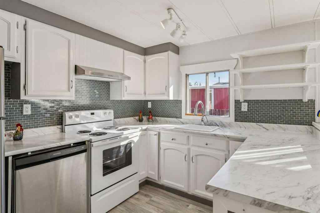 MLS® A2264810 - 12 Spring Haven Road SE in Big Springs Airdrie, Residential