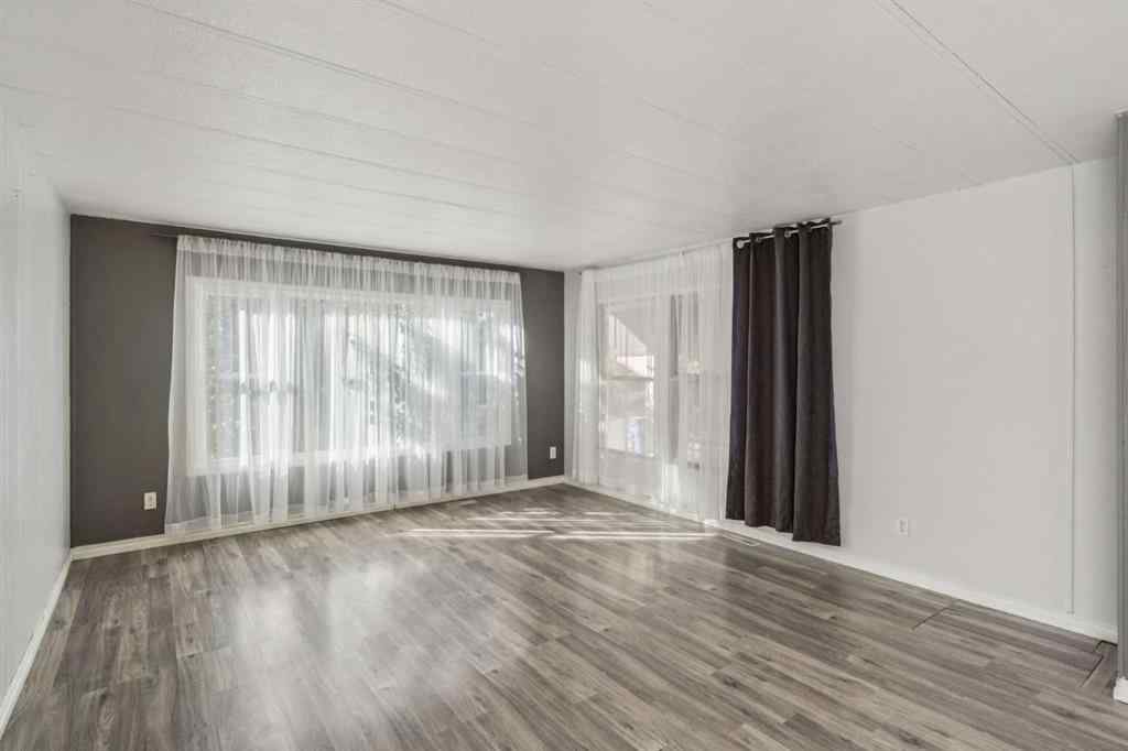 MLS® A2264810 - 12 Spring Haven Road SE in Big Springs Airdrie, Residential