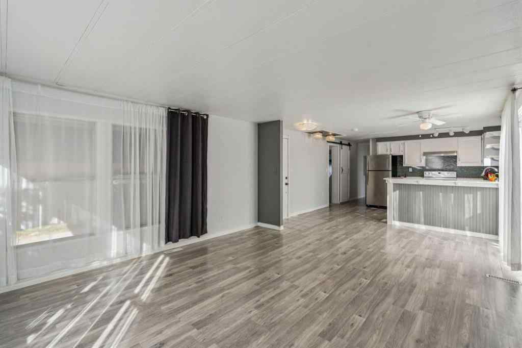 MLS® A2264810 - 12 Spring Haven Road SE in Big Springs Airdrie, Residential