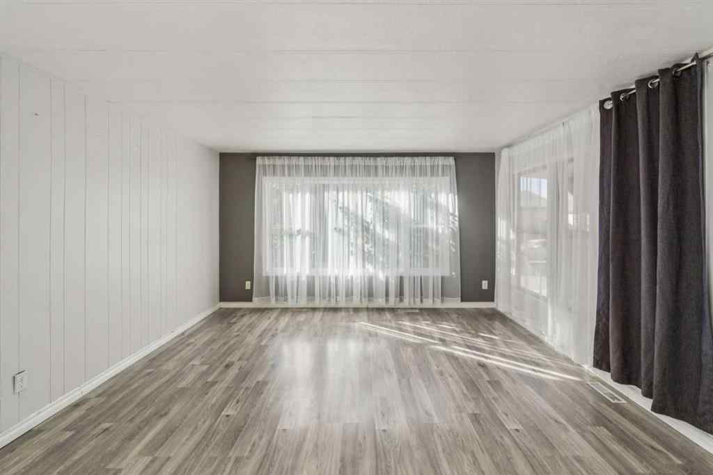 MLS® A2264810 - 12 Spring Haven Road SE in Big Springs Airdrie, Residential