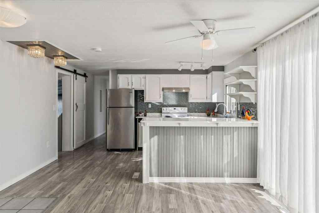 MLS® A2264810 - 12 Spring Haven Road SE in Big Springs Airdrie, Residential